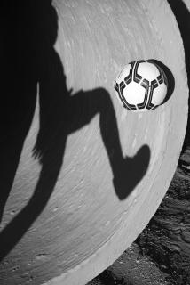 Play football with the shadow 