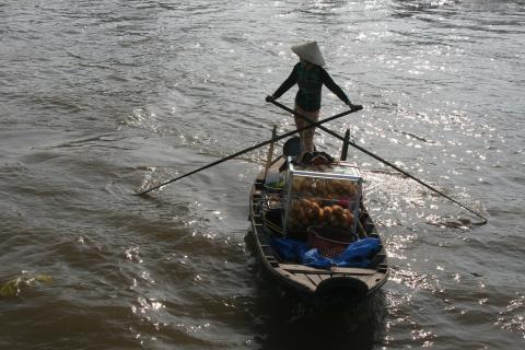 Marktfrau auf den Mekong Delta 