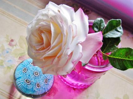 rose with paperweight
