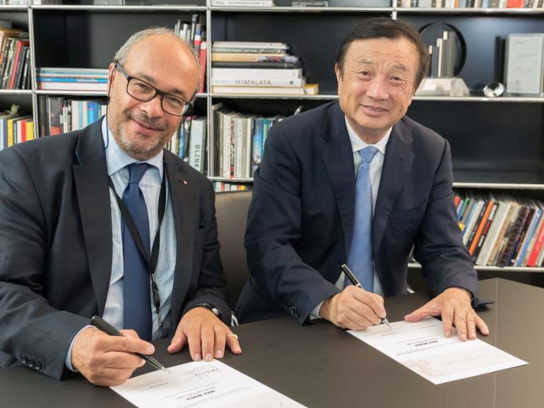 Dr. Andreas Kaufmann, Mehrheitseigentümer und Aufsichtsratsvorsitzender der Leica Camera AG und Ren Zhengfei, Gründer von Huawei.