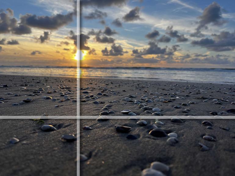 Mit Sicherheit kein perfektes Bild, aber dank der Beachtung der Drittelregel durchaus ansehnlich. Die weißen Balken zeigen: Die Schärfeebene beginnt horizontal, die Sonne liegt genau auf der vertikalen Drittelung.